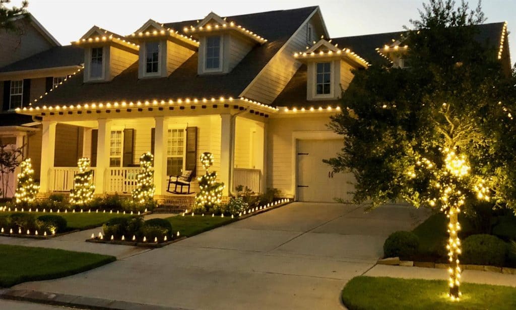 Christmas and Holiday lighting of this beautiful house done by GreenGate Turf & Pest at Taxes